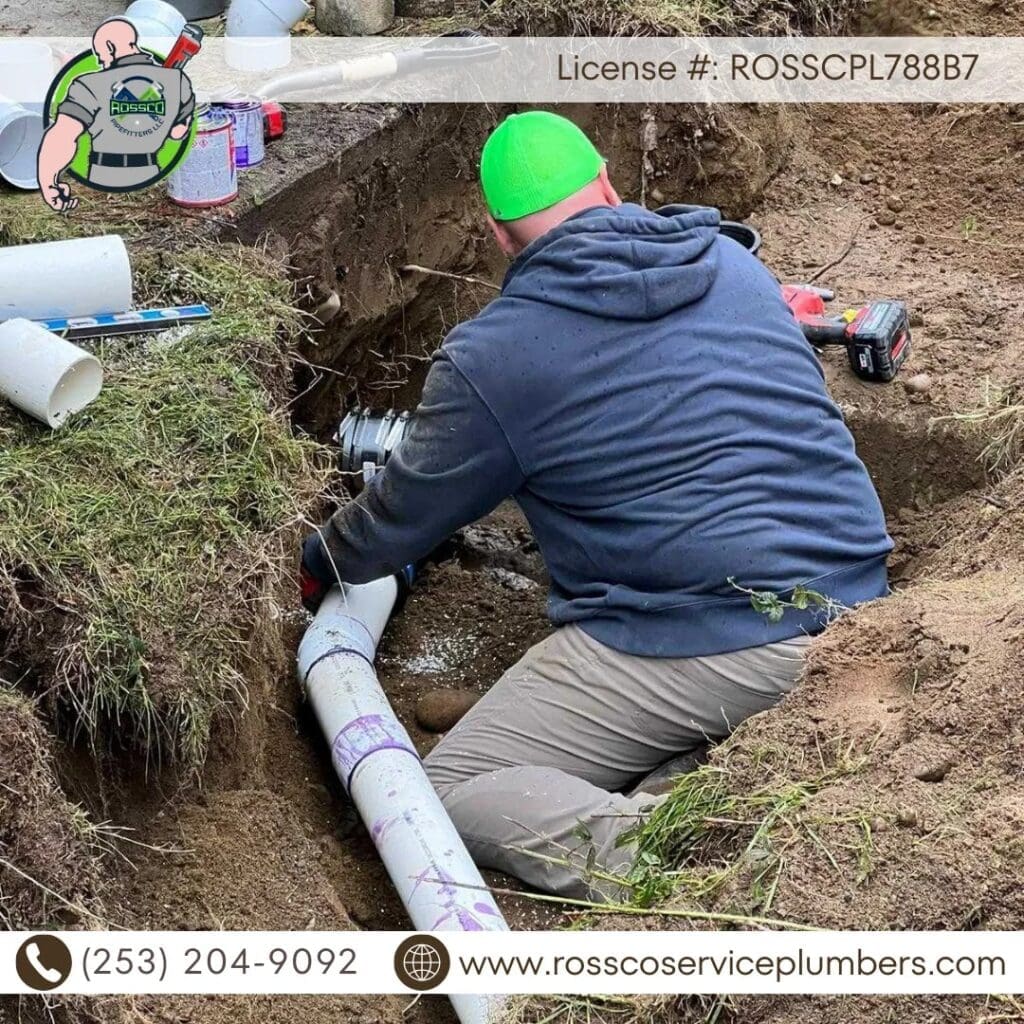 Person working on underground plumbing